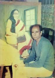 The Writer before his painting of his wife Gouri Devi
